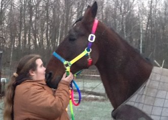 Katie shows special affection for her Standardbred horse Lucky